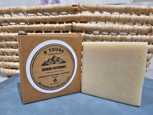 Cream-colored Ginger Patchouli Soap bar beside its B Young kraft box with memorial label.